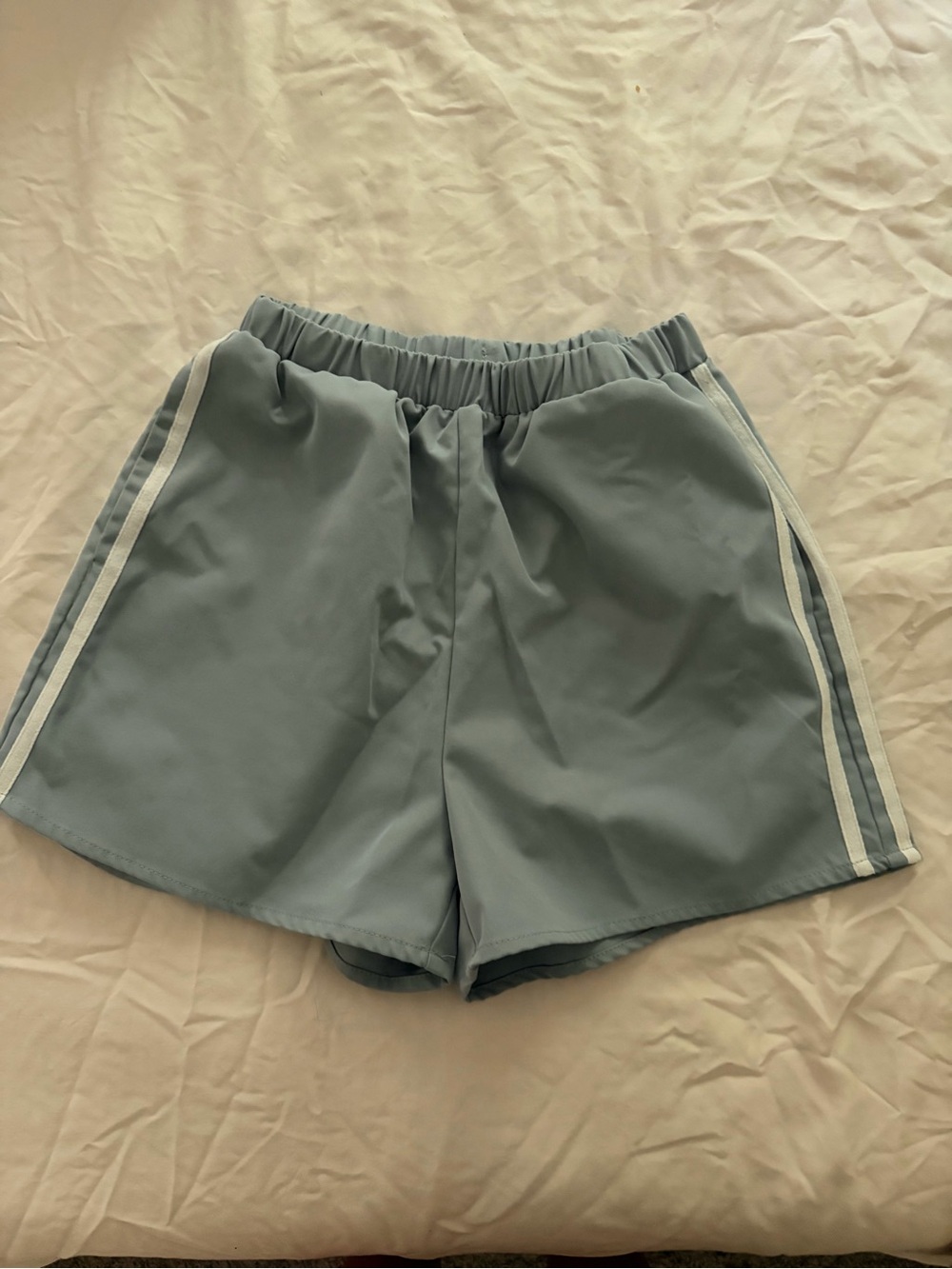 Women’s Light Blue Athletic Shorts with White Side Stripes